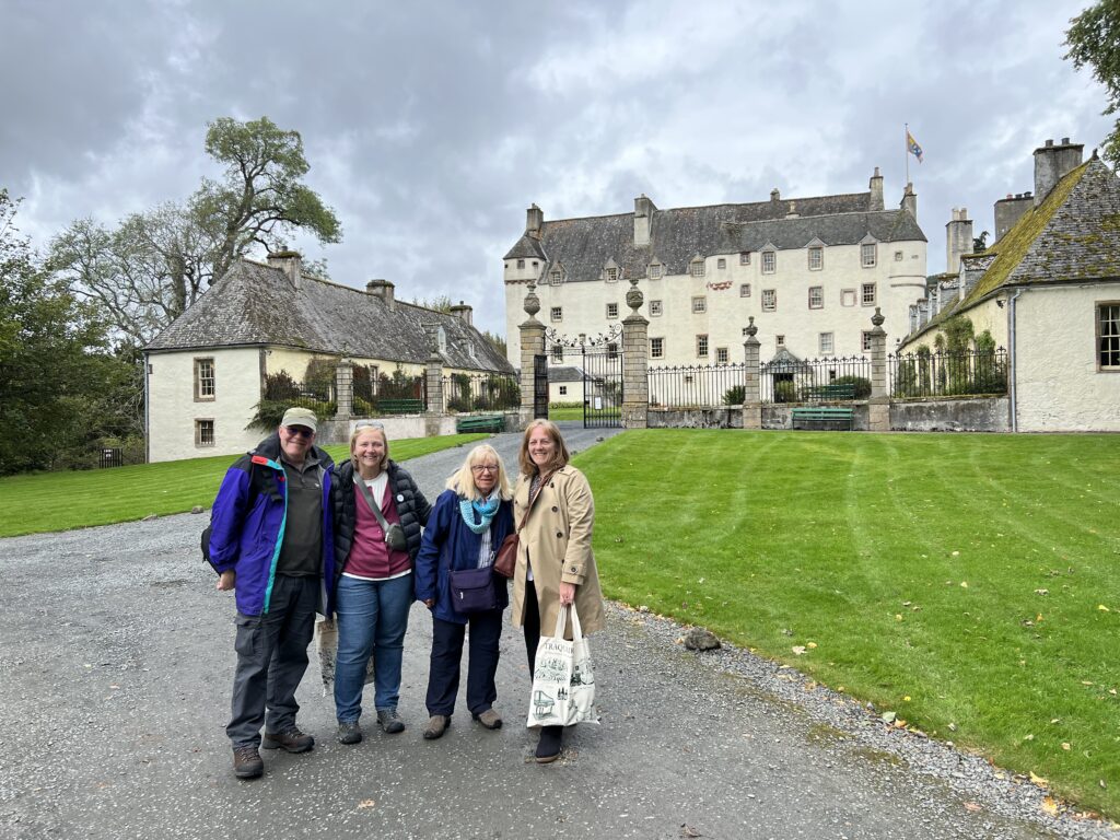 Traquair House with group