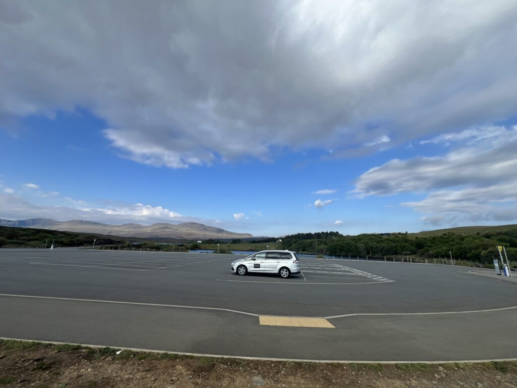 Tour car in empty Kilt Rock carpark